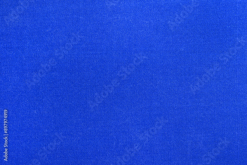 Textured surface in blue with fabric structure.