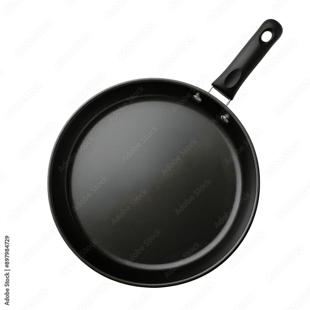 A black pan with a handle sits on a white background A black pan with a handle sits on a white background