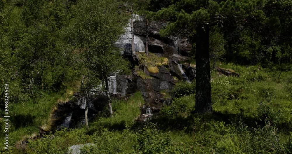 Summer in Norway. Beautiful waterfalls in the mountains. Summer in Norway. Beautiful waterfalls in the mountains.