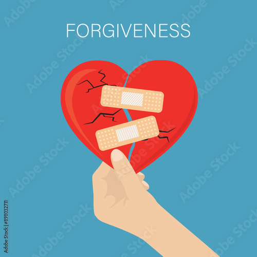 Hand holding fixed broken heart. Repaired broken red heart with plaster. Recovery, relationship concept. forgiveness of resentment and disappointment
