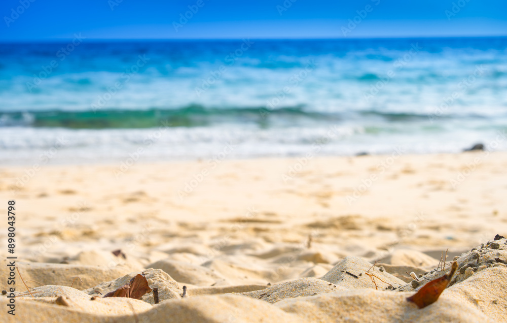 Nature of the beach and sea Summer with sunshine, sandy beaches, clear blue waters sparkling against the blue sky. On an island with good ecology and environment Background for summer vacation concept Nature of the beach and sea Summer with sunshine, sandy beaches, clear blue waters sparkling against the blue sky. On an island with good ecology and environment Background for summer vacation concept