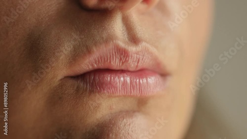 Beautiful young Caucasian woman eating berry bright juicy jelly. High quality 4k footage