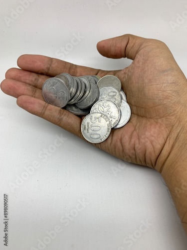 pile of coins in Indonesian rupiah from personal savings photo