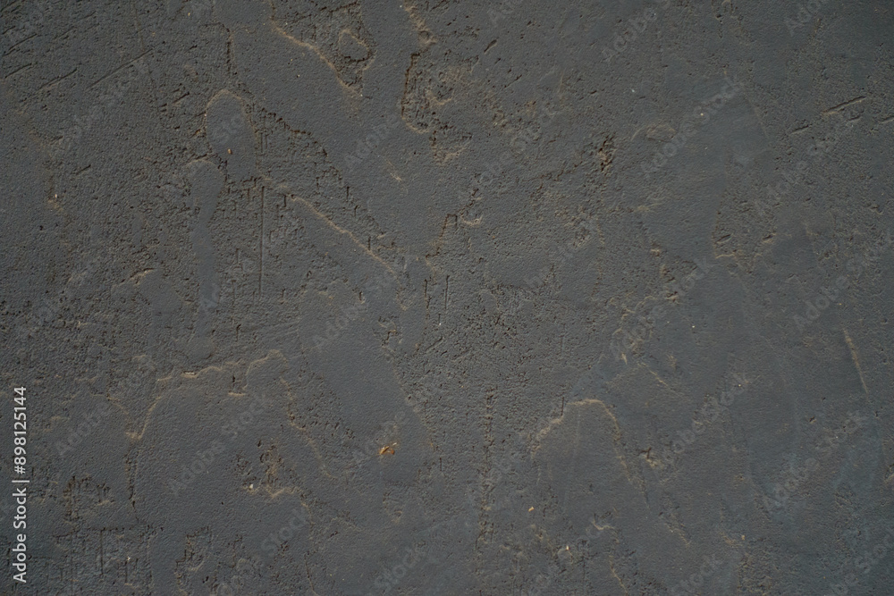 Macro of dusty and weathered dark grey painted wall Macro of dusty and weathered dark grey painted wall