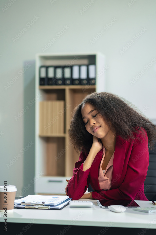Business woman is doing a stretchy posture due to sitting in the office for too long, office syndrome concept. Business woman is doing a stretchy posture due to sitting in the office for too long, office syndrome concept.