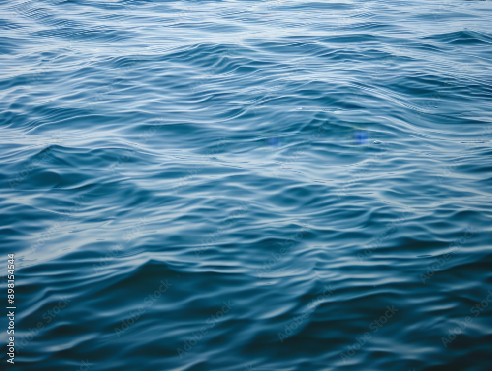 Blue ocean water ripples gently Blue ocean water ripples gently
