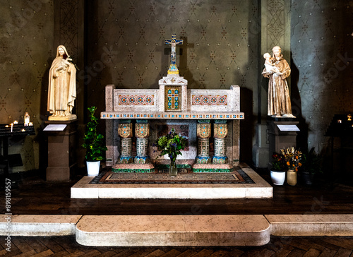 An altar inside the Roman Catholic church of Saint-Jean de Montmartre, in place des Abbesses, Montmartre district, 18th arrondissement, Paris, France photo