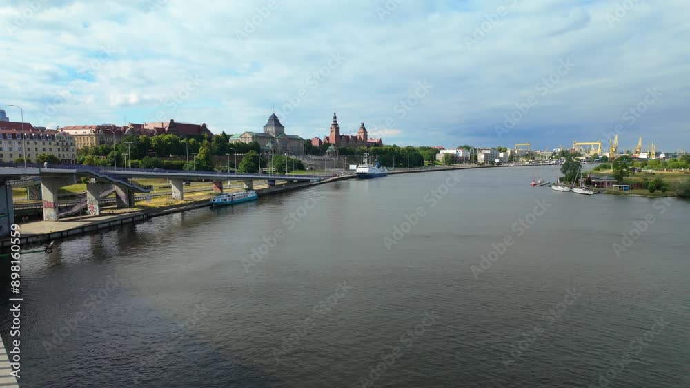 Scenic view of Szczecin's Chrobry Embankment along the Odra River on a cloudy day Scenic view of Szczecin's Chrobry Embankment along the Odra River on a cloudy day