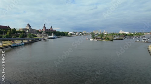 Szczecin's odra river and chrobry embankment with historic buildings and greenery, aerial view photo