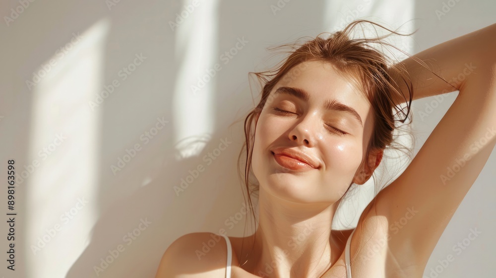 Gorgeous Caucasian girl raises her hands, clutching her hair. Young woman with beauty, hair removal, sugaring, smooth armpit skin, salon body and armpit skin care. girl with closed eyes, happy Gorgeous Caucasian girl raises her hands, clutching her hair. Young woman with beauty, hair removal, sugaring, smooth armpit skin, salon body and armpit skin care. girl with closed eyes, happy