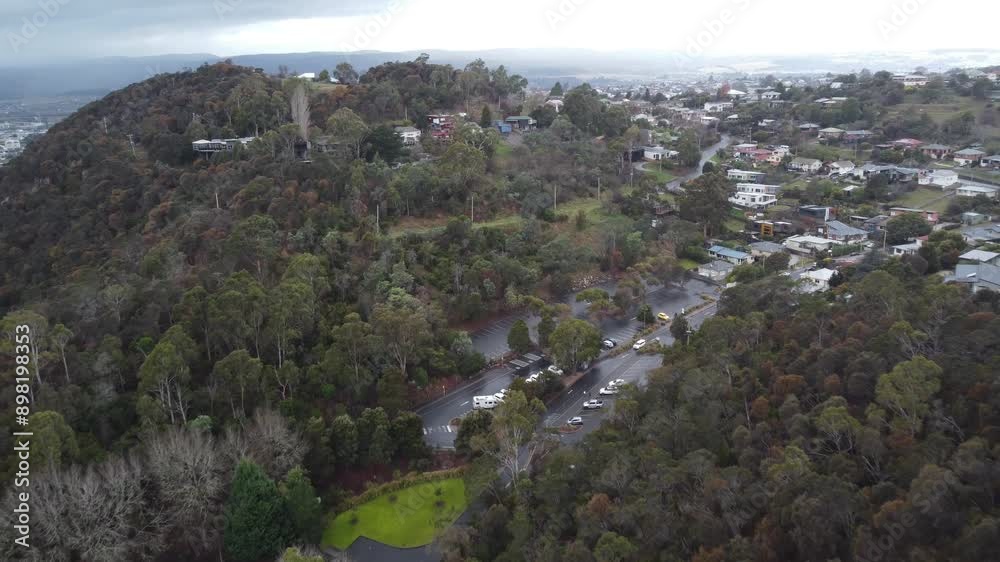 Aerial view of a small Australian town in the mountains in Tasmania State Aerial view of a small Australian town in the mountains in Tasmania State