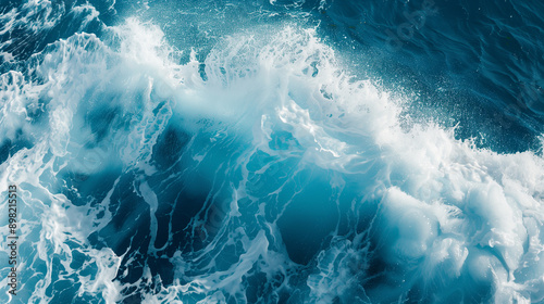 Fototapeta Naklejka Na Ścianę i Meble -  Powerful blue breaking ocean waves with white foam