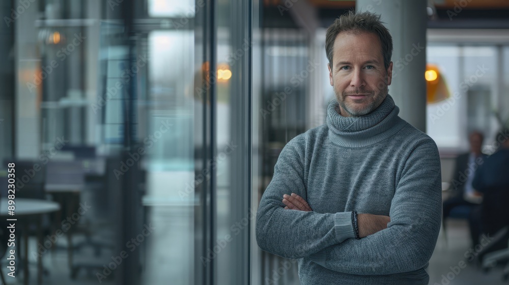 The man in grey sweater The man in grey sweater
