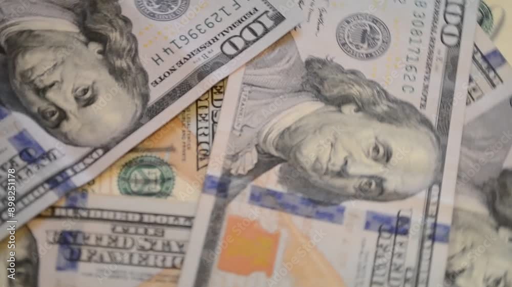 Rotation paper money close-up. Background with money american hundred dollar bills. Rotation paper money close-up. Background with money american hundred dollar bills.