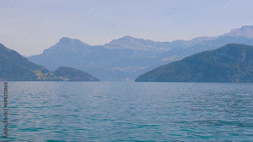 Stunning view of Lake Lucerne in the early morning in summer. Stunning view of Lake Lucerne in the early morning in summer.