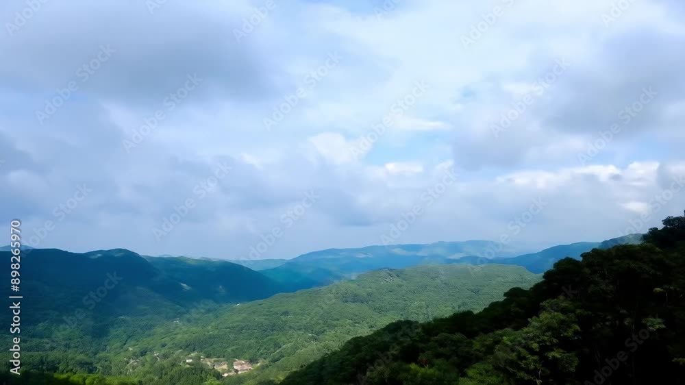 Scenic Mountain View with Clouds and Forest
Scenic Mountain View with Clouds and Forest