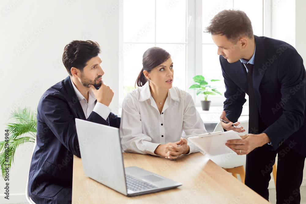 Agent helping family couple clients to make sale purchase, deal insurance contract during meeting with estate agent, lawyer or bank manager, customers make financial deal, office business talk to plan Agent helping family couple clients to make sale purchase, deal insurance contract during meeting with estate agent, lawyer or bank manager, customers make financial deal, office business talk to plan