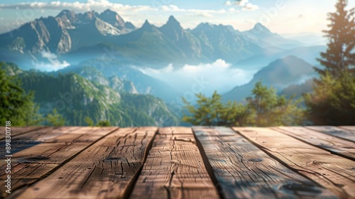 Empty wooden table top product display showcase stage. Blurred mountains in the background, with peaks reaching to the sky. 