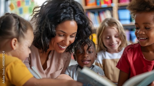 A young teacher  is helping  children at school