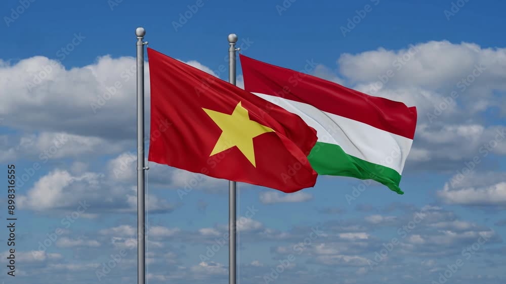 Hungary and Vietnam flags flying together, video concept of the relationship, two country relations concept