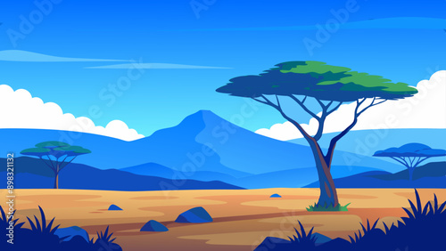 African savannah landscape with trees, rocks, and open grassland under a clear blue sky