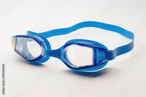 A pair of blue swim goggles with clear lenses and adjustable straps, placed on a white background