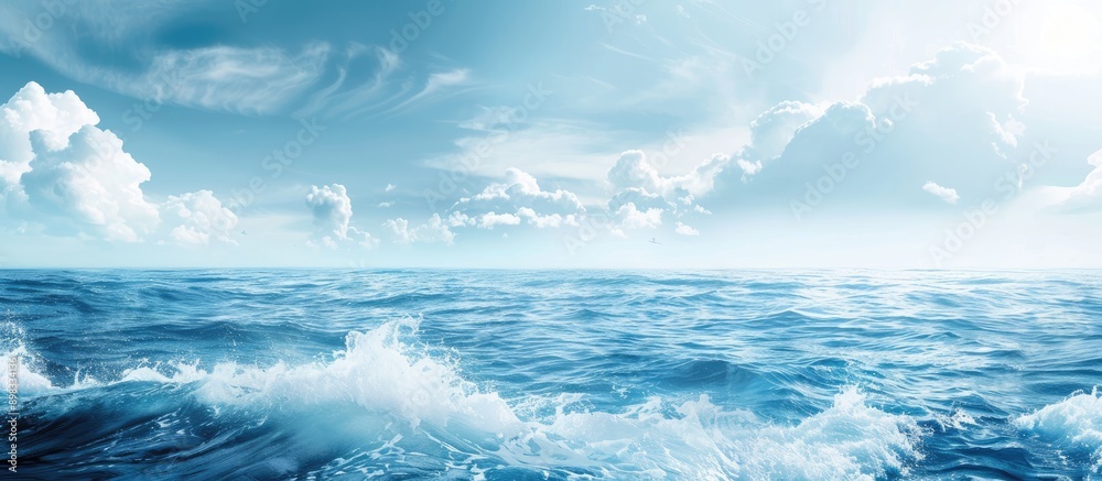 Blue ocean waves blending with a sky backdrop ideal for adding text with available copy space image Blue ocean waves blending with a sky backdrop ideal for adding text with available copy space image