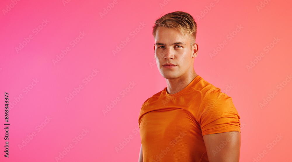 Portrait, confidence and man in studio for sport, health or wellness isolated on background mockup space. Face, fitness athlete and strong bodybuilder or determined person in shirt with muscle in USA Portrait, confidence and man in studio for sport, health or wellness isolated on background mockup space. Face, fitness athlete and strong bodybuilder or determined person in shirt with muscle in USA