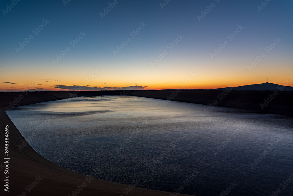 Fototapeta premium Dlouhe Strane dam with Praded hill on the background in Jeseniky mountains in Czech republic during summer sunrise