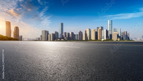 Generative AI Empty asphalt road and modern city skyline with building in Hangzhou,China. © kimberly