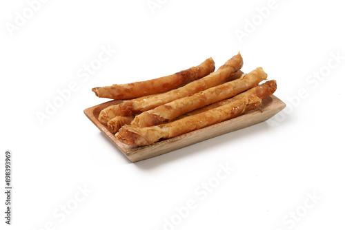 Banana rolls is traditional snacks from Indonesia. made of fried banana wrapped in spring roll skin, cheese roll, street food , good for article