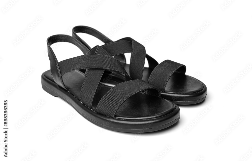 Women's black leather sandals isolated on white background.