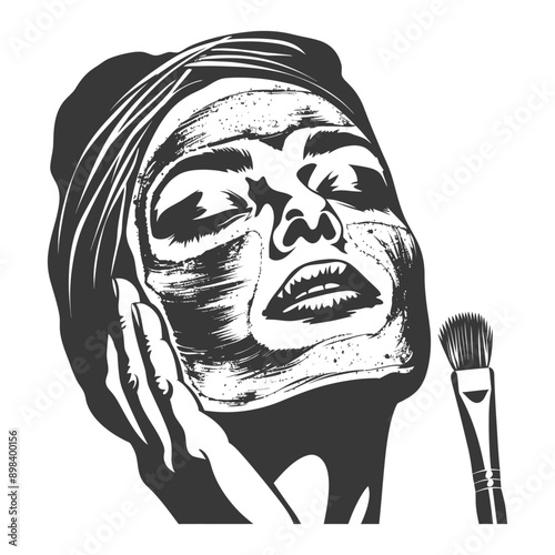 A woman with a face mask and a makeup brush
