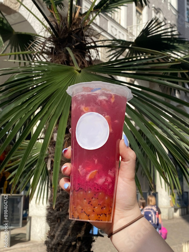 bubble tea and palm tree inthe background