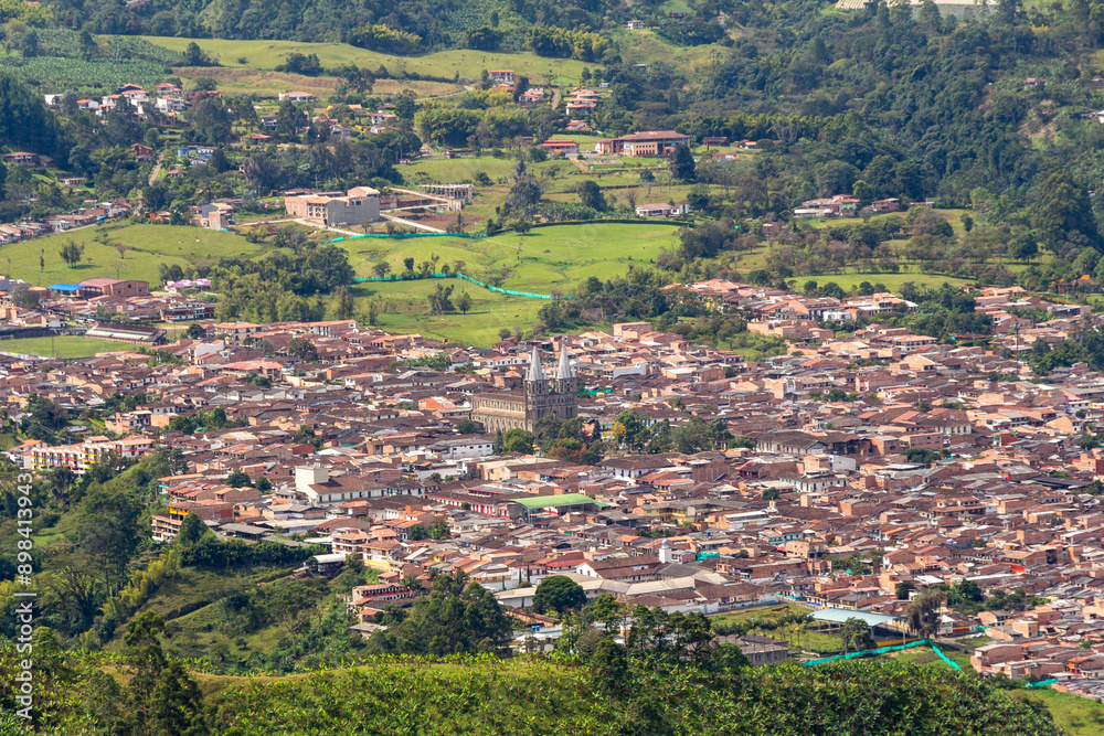 Fototapeta premium Cityscape of Jardin, Jardín, Antioquia, Colombia. Awesome landscape with the green Andes Mountains.