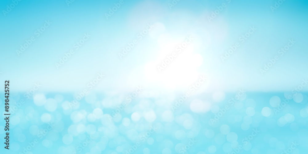 A bright blue background of a warm spring, summer sky and distant horizon over a blue ocean or sea with light reflecting off the surface from sun flare on the right.
