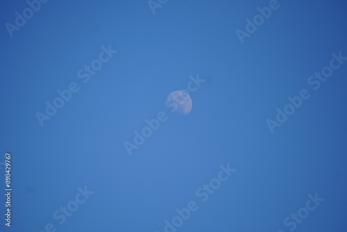 Moon in the sky at the daytime.