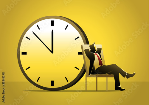 Employee sat relaxing behind large clocks and time continued to tick by