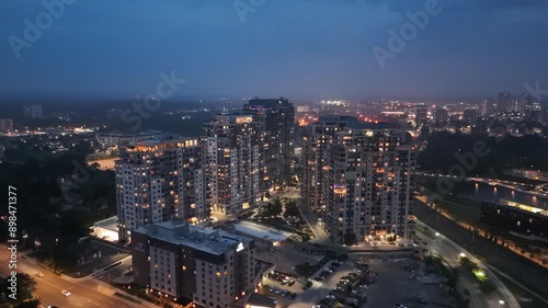 Wallpaper Mural Ascending aerial footage of the Barrel Yards apartment complex illuminated at dusk, Canada Torontodigital.ca