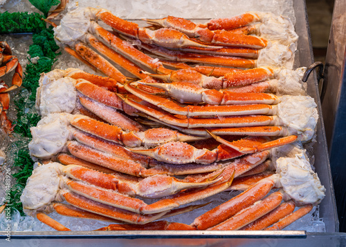 Obraz na płótnie Frozen Alaska king crab legs in Washington D.C. fish market at the Wharf. w salonie