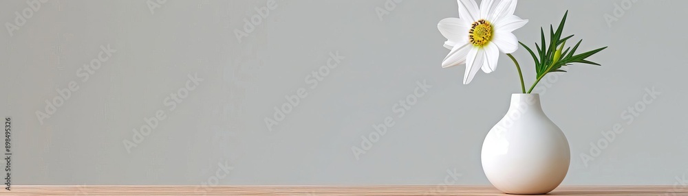 Minimalistic still life with a single flower in a vase, clean and elegant Minimalistic still life with a single flower in a vase, clean and elegant