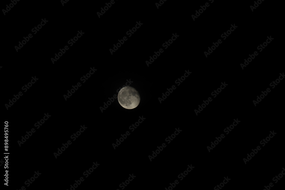 Full moon photographed using a 200mm telephoto lens taken from Kobe Hyogo, Japan Full moon photographed using a 200mm telephoto lens taken from Kobe Hyogo, Japan