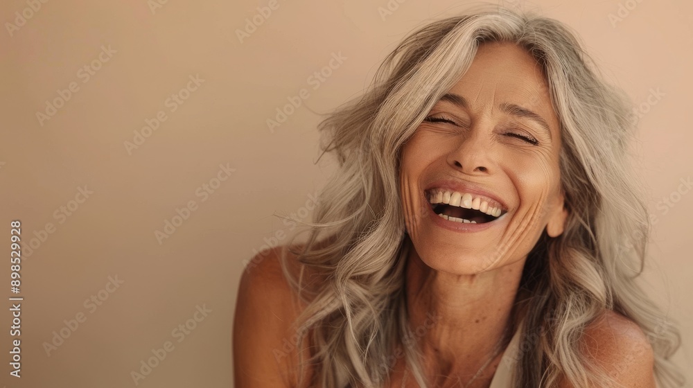 A healthy older woman with healthy hair and glowing skin A healthy older woman with healthy hair and glowing skin