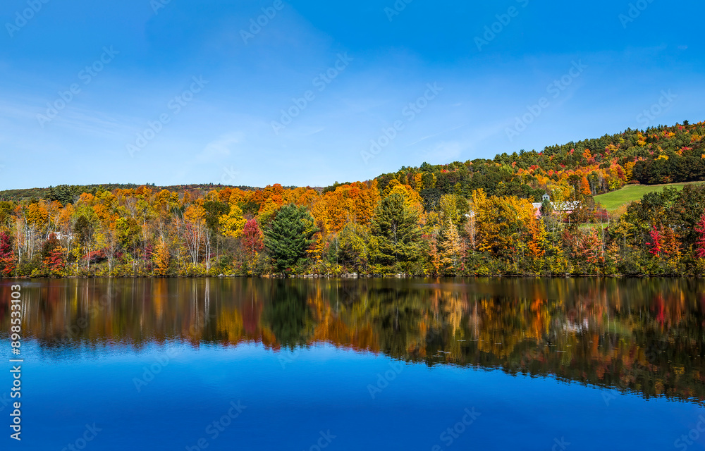 Autumn lake in autumn forest. Forest lake in autumn. Autumn forest lake water Autumn lake in autumn forest. Forest lake in autumn. Autumn forest lake water