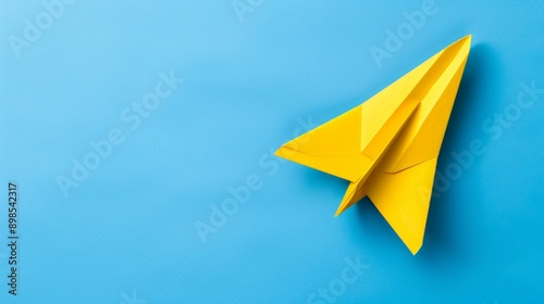 Wallpaper Mural Yellow paper plane on blue background, Business competition concept. copy space Torontodigital.ca