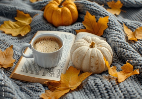 A Cup of Coffee and a Book on a Blanket