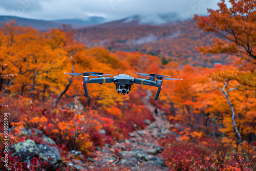 Enthusiast guides drone over vibrant russet Appalachian Trail foliage in a serene September hiking expedition with ample background space for text photo