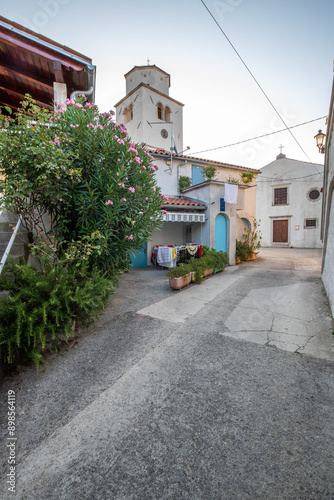 Fototapeta Naklejka Na Ścianę i Meble -  Old historical dreamy streets. Beautiful houses and businesses in a romantic tourist location. Beautifully landscaped streets and small squares in Brseč, Istria, Croatia