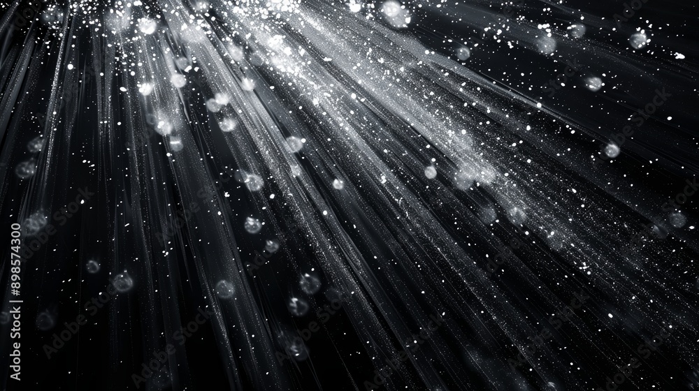 Abstract background showing diagonal silver glitter streaks converging on black Abstract background showing diagonal silver glitter streaks converging on black