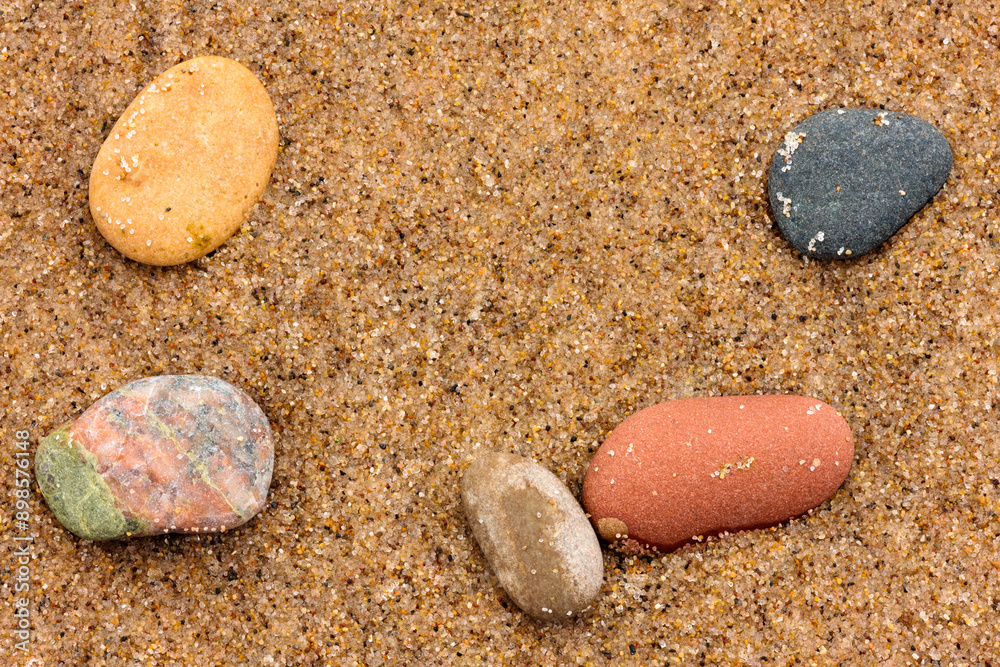 Colorful stones rest naturally on the beach at Kohler-Andrae State Park, Sheboygan, Wisconsin in late June Colorful stones rest naturally on the beach at Kohler-Andrae State Park, Sheboygan, Wisconsin in late June